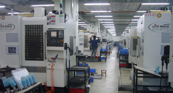 injection molding warehouse storing multiple mold blocks